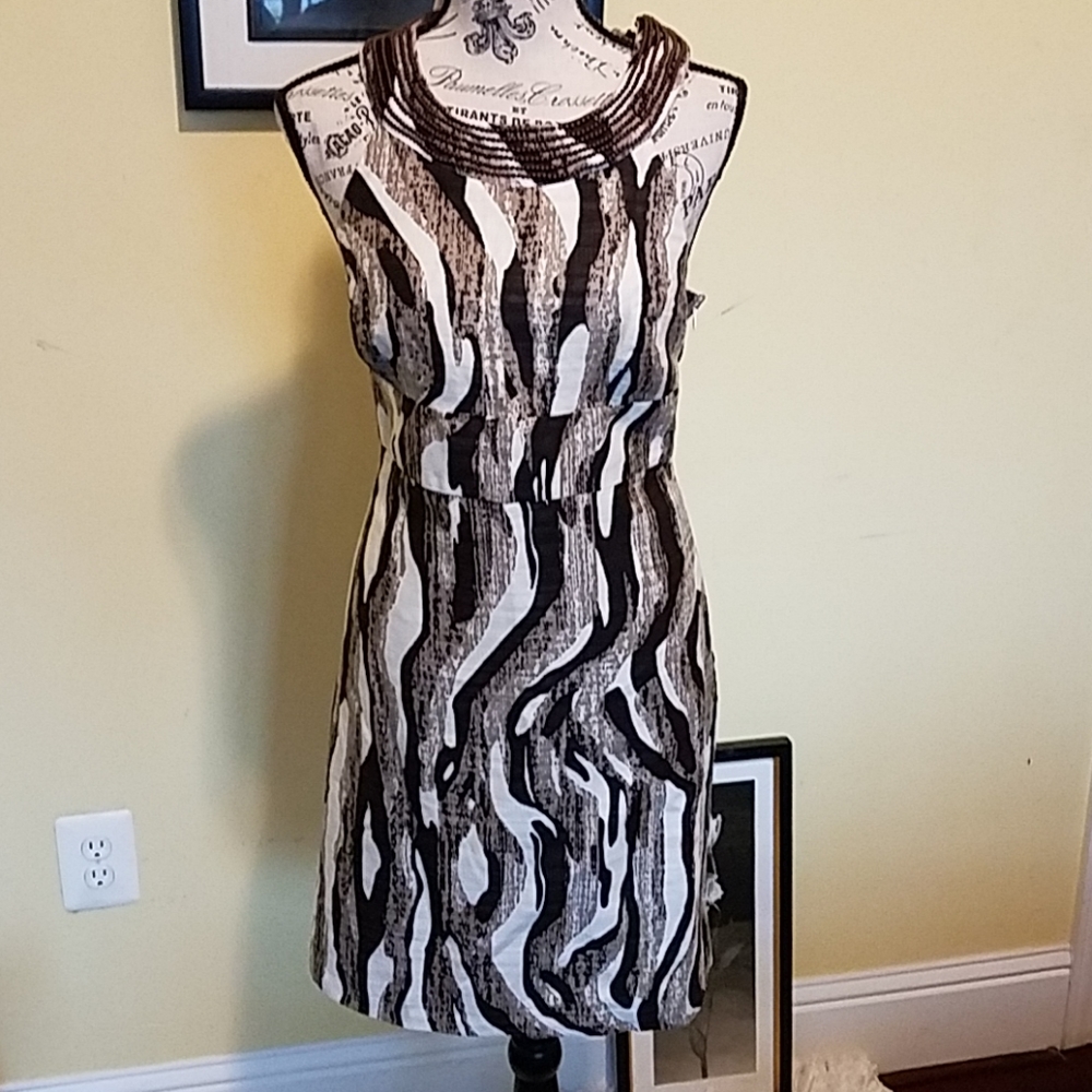 Ann taylor animal print mini with beaded neck.